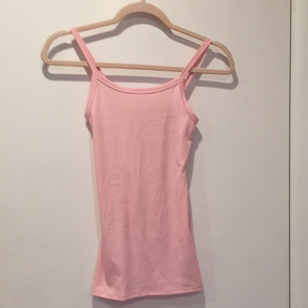 Pastel pink tank top.